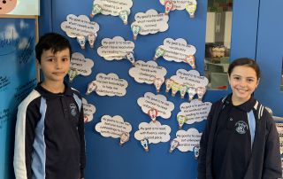 Our Lady of Mount Carmel Catholic Primary School Mt Pritchard Bonnyrigg - students at Learning goals wall