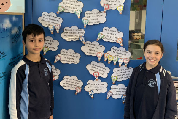 Our Lady of Mount Carmel Catholic Primary School Mt Pritchard Bonnyrigg - students at Learning goals wall